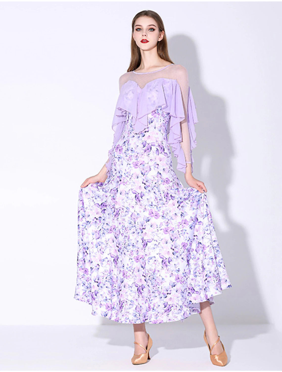 Close-up of the printed fabric and ruffles on the ballroom dance dress.