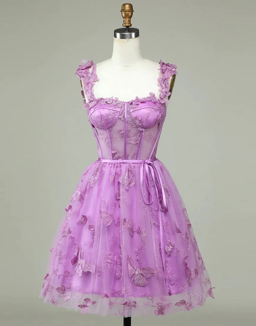Purple A-line homecoming dress with lace-up back and appliques.