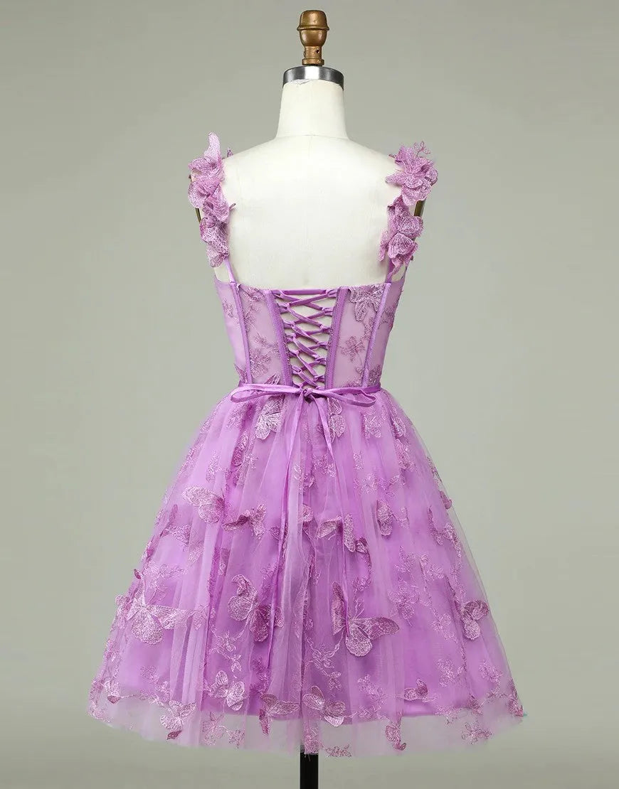Back view of purple A-line tulle dress with lace-up detail.