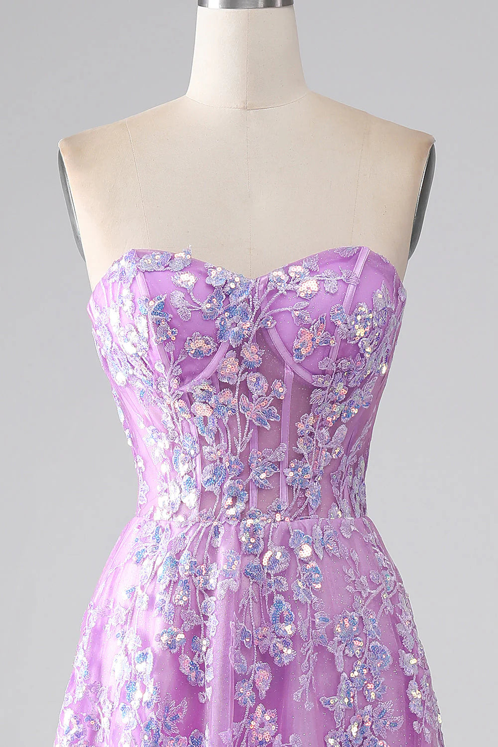 Side view of the elegant purple prom dress.