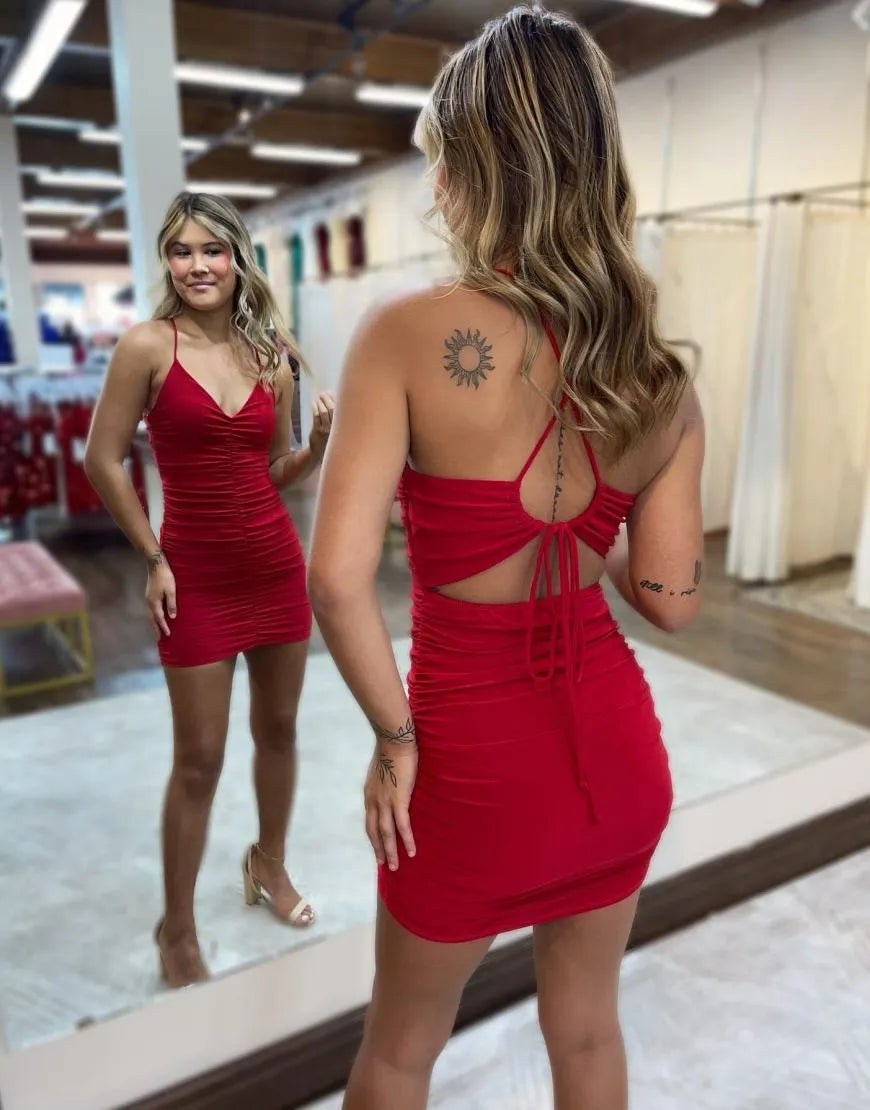 Back view of a red A-line spaghetti strap dress featuring a keyhole design.