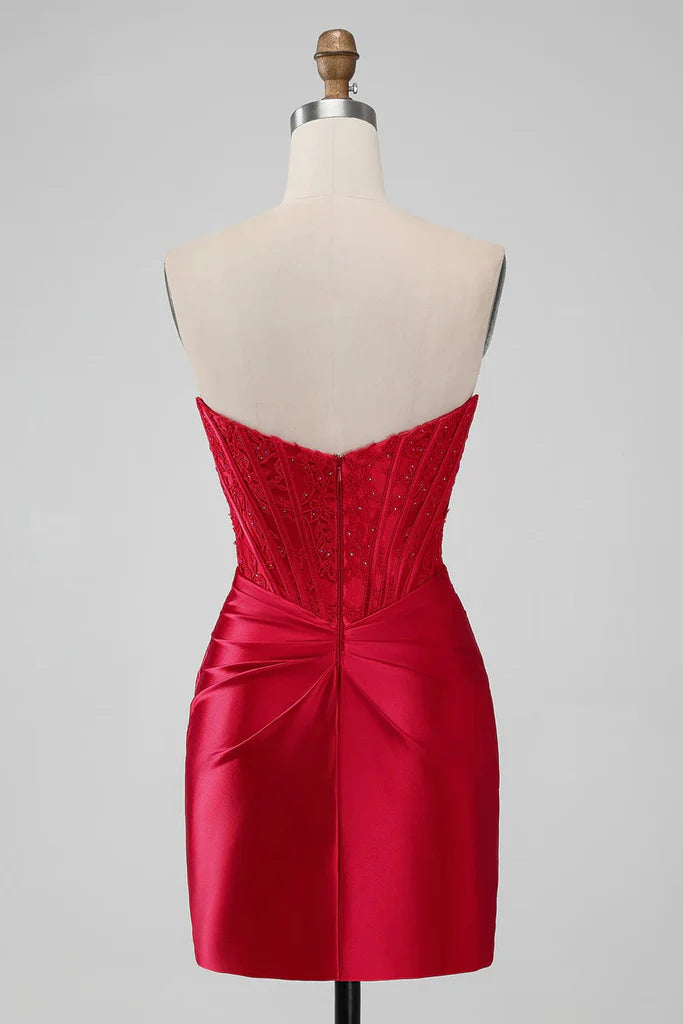 Side view of a woman in a red strapless bodycon dress.