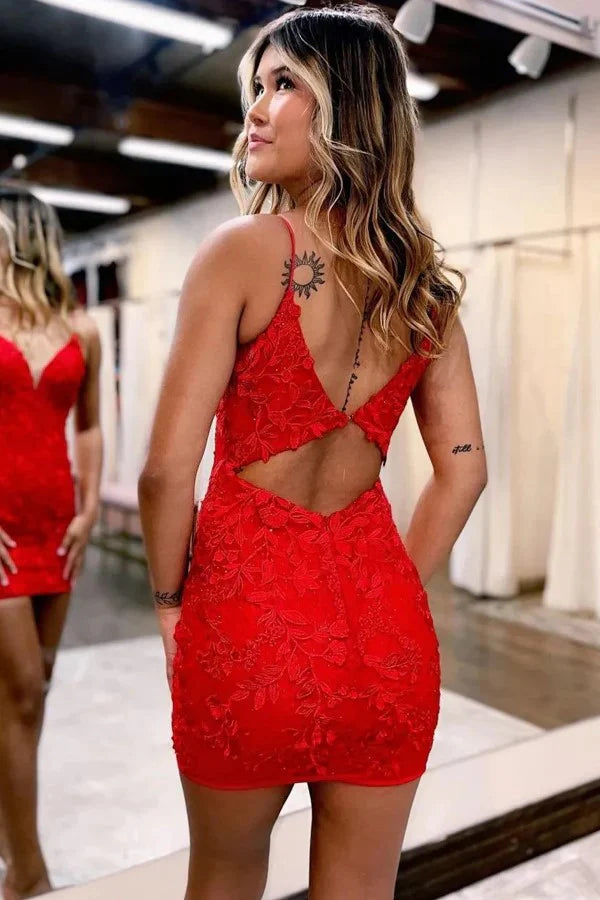 Back view of a red bodycon homecoming dress with spaghetti straps and appliques.