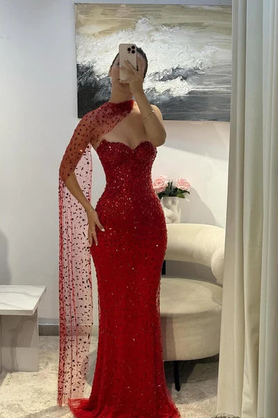 Elegant red sweetheart mermaid strapless prom dress with sparkling gemstone details.