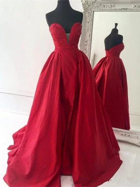 Model wearing a red sweetheart neck backless ball gown.