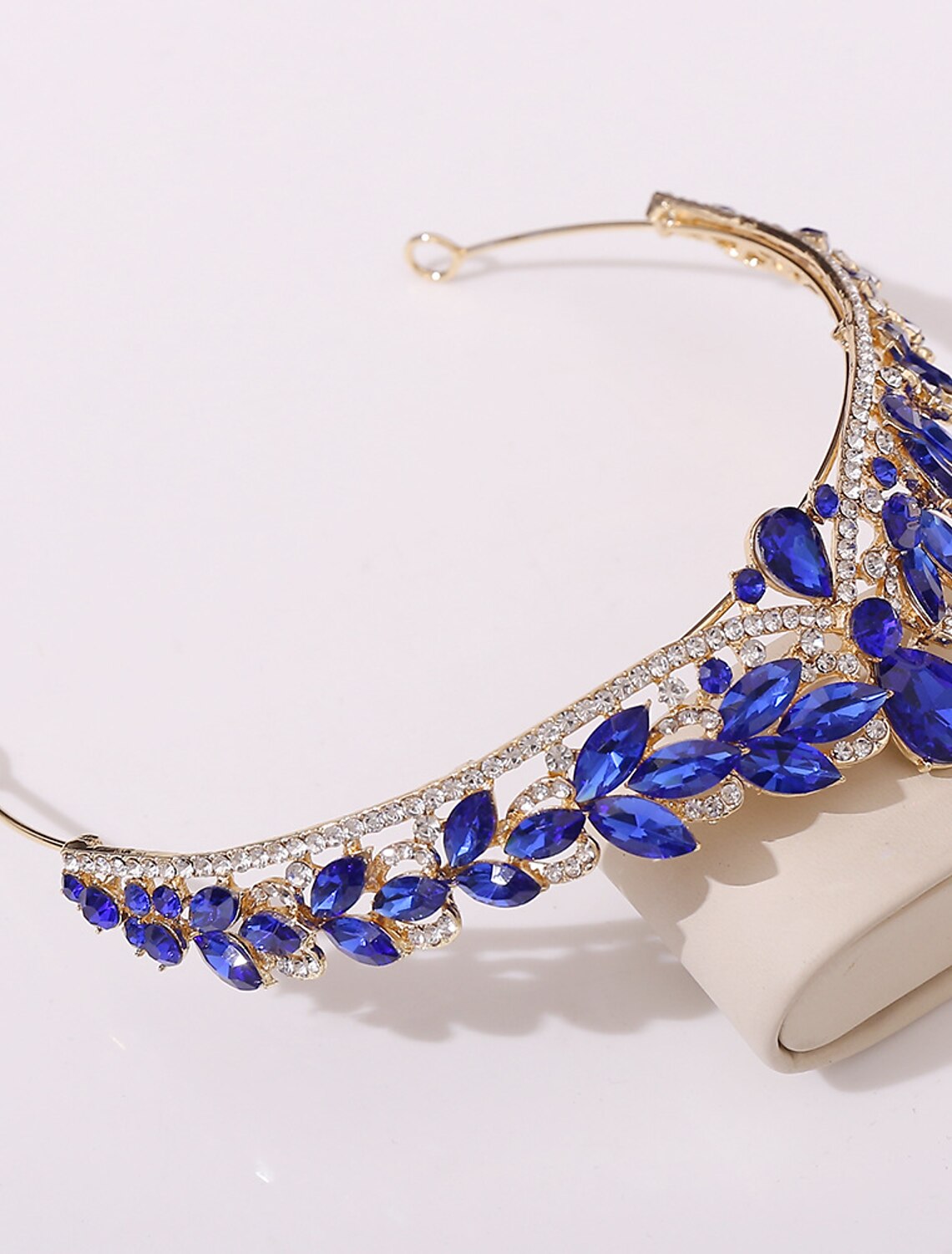 Detailed shot of the crystal embellishments on the rhinestone alloy headpiece.