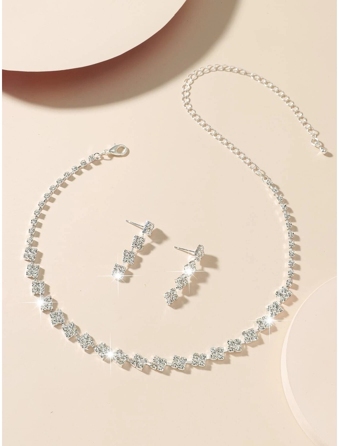 Close-up of a sparkling rhinestone alloy necklace with intricate design.