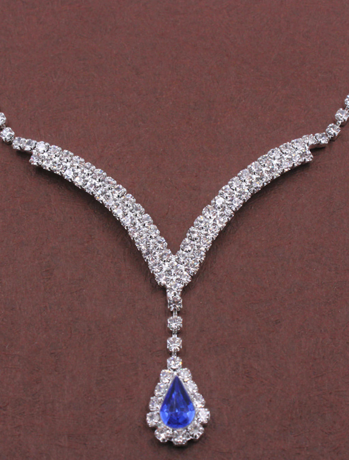 Full view of the rhinestone bridal jewelry set on display.