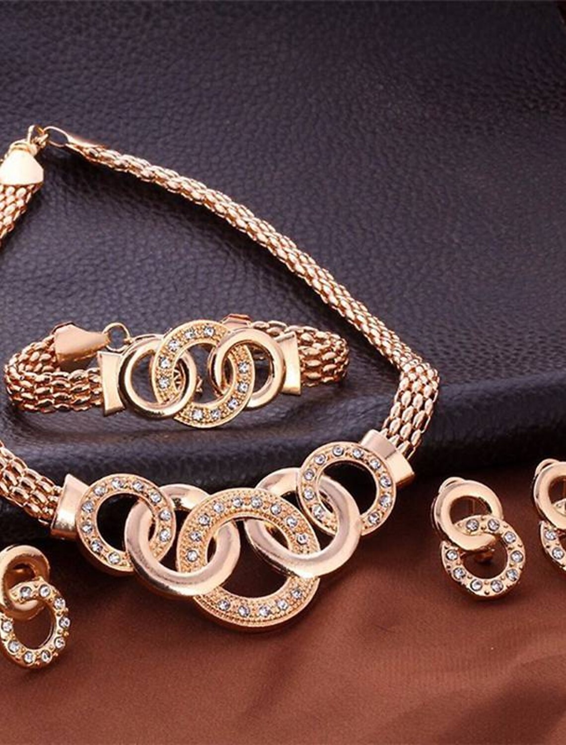 Sparkling women's jewelry set with chrome finish and clear rhinestones.