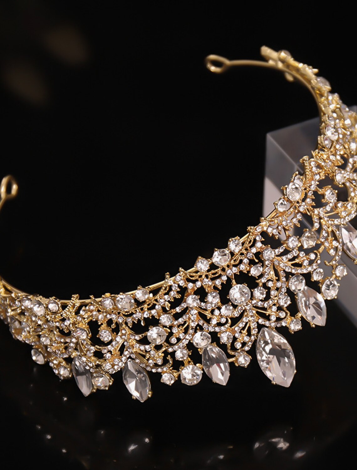 Rhinestone crystal crown tiara headband on a white background.