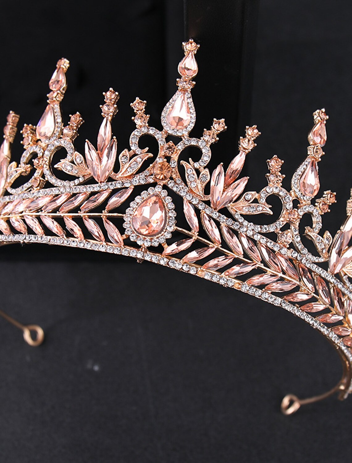 Elegant rhinestone tiara crown with intricate crystal details.
