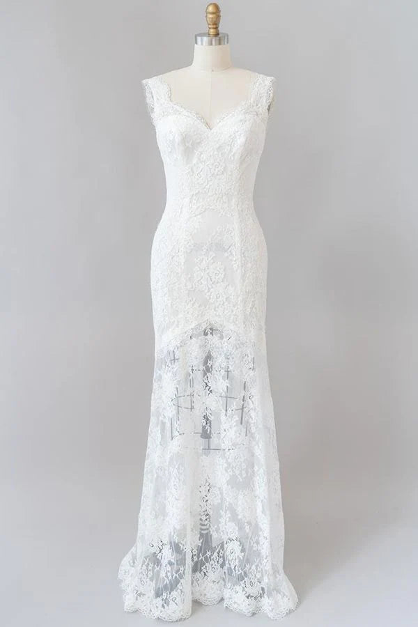 Elegant lace mermaid wedding dress with sweetheart neckline and backless design.