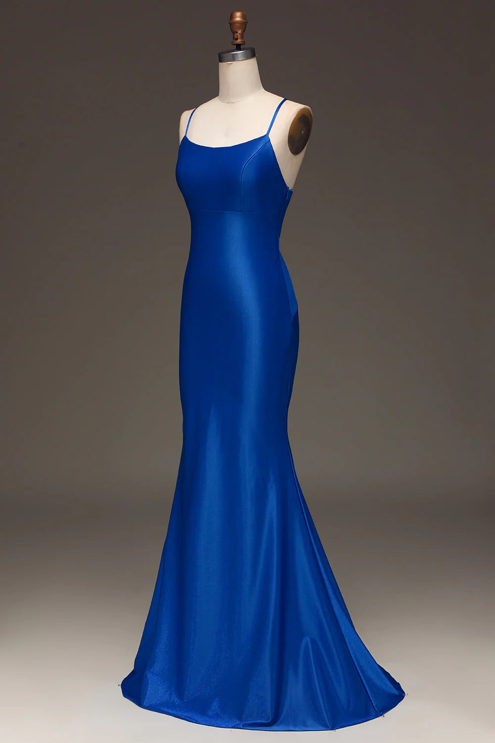 Royal blue mermaid satin prom dress, back view.