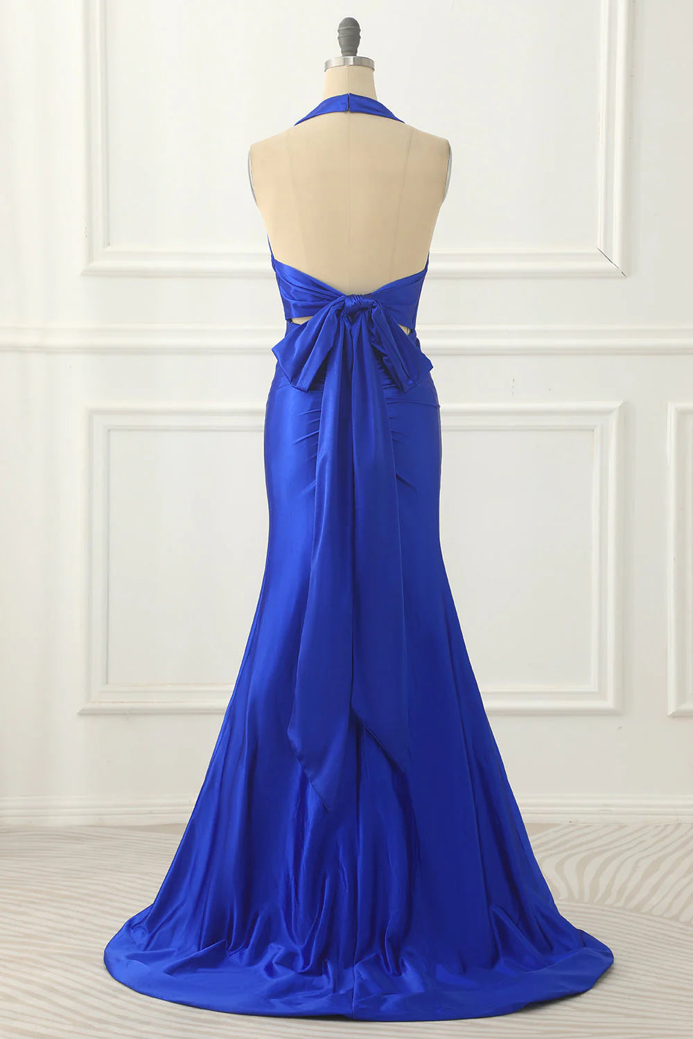 Side view of the royal blue satin prom dress, showing the flowing A-line skirt.