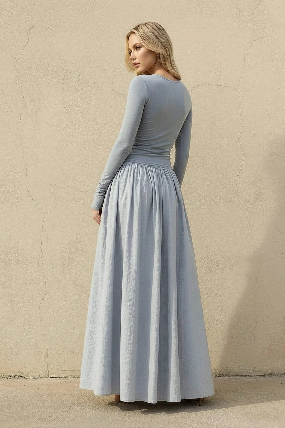 Back view of the elegant long sleeve velvet A-line formal dress.