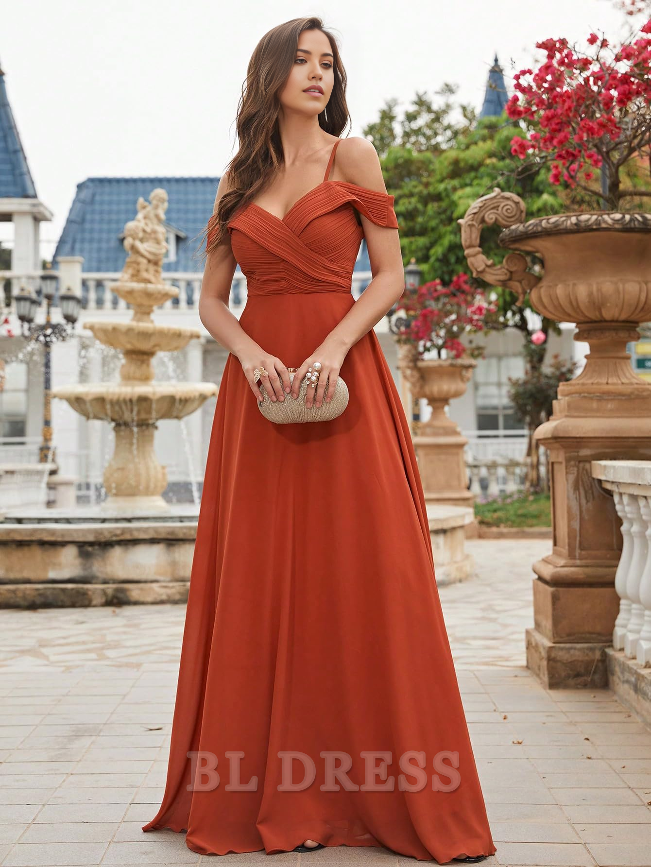 Close-up of the ruched detail on a chiffon bridesmaid dress.