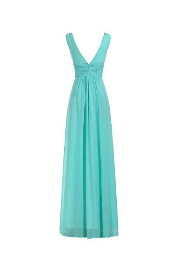 Side view of the ruched V-neck maxi gown, highlighting the flowing skirt.