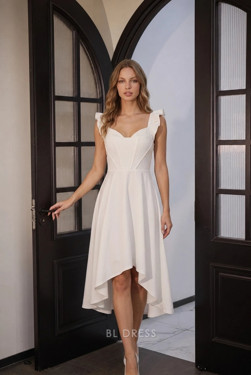 Model wearing an ivory A-line high-low prom dress with ruffled sweetheart neckline and bow back.