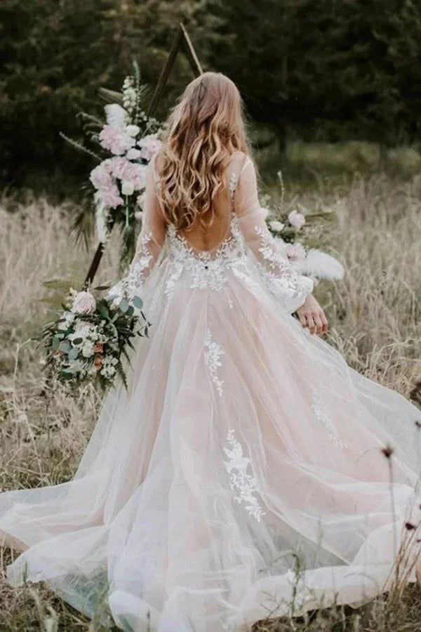 Back view of the rustic A-line V-neck long sleeve wedding dress.