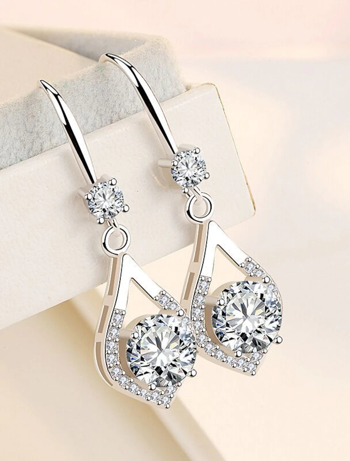 Close-up of S925 sterling silver drop earrings.