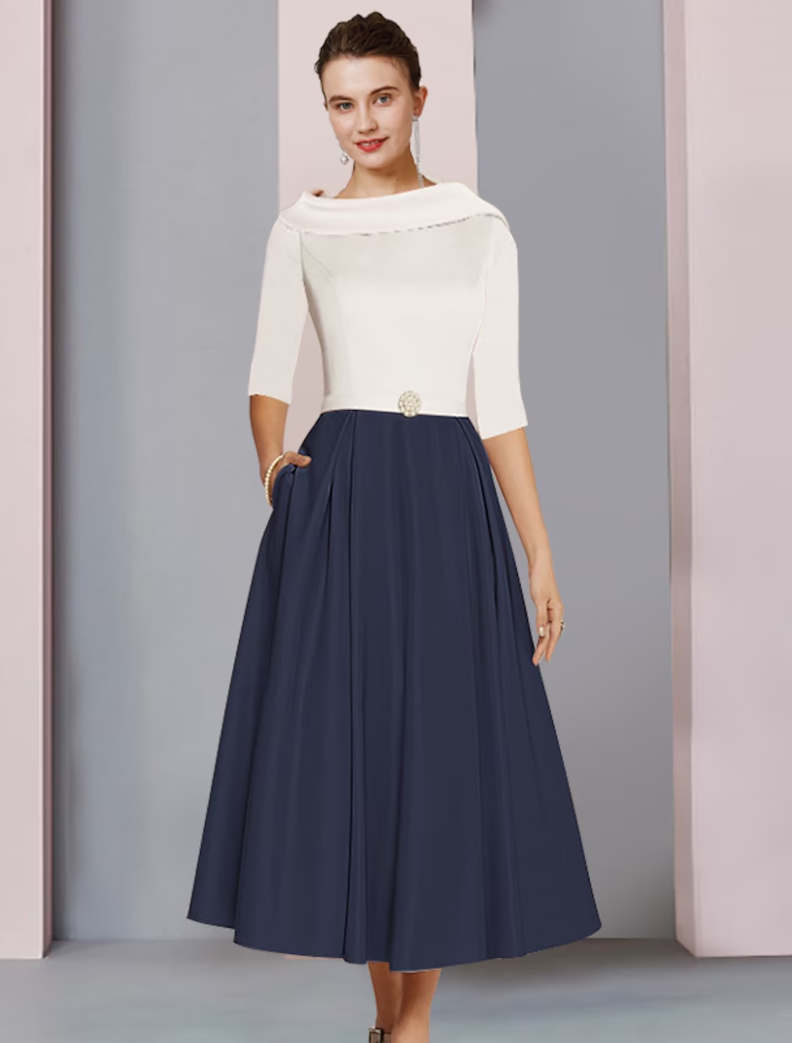 Full view of the elegant A-line satin tea-length dress.