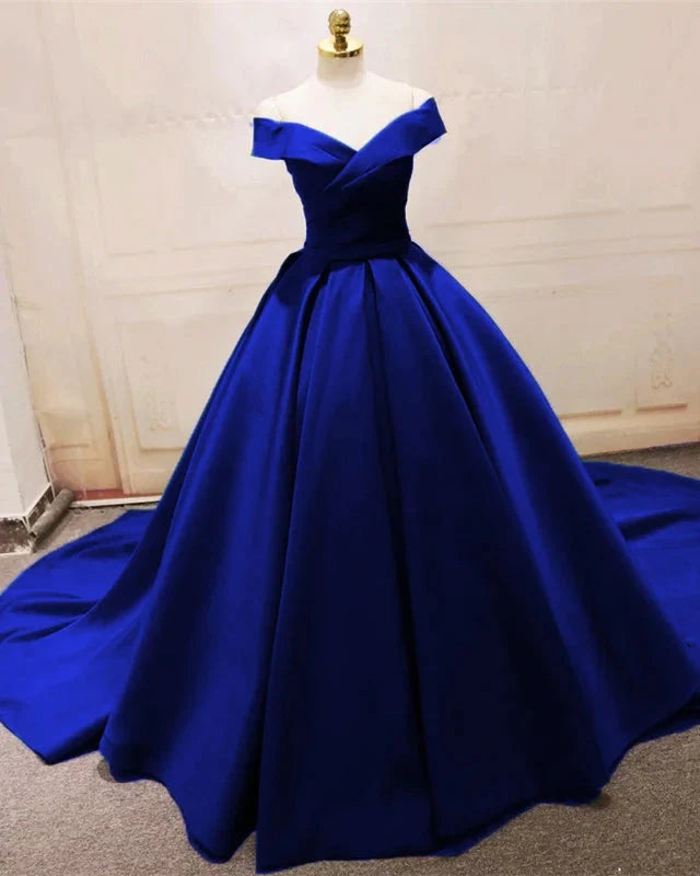 Royal blue A-line satin off-shoulder ball gown.