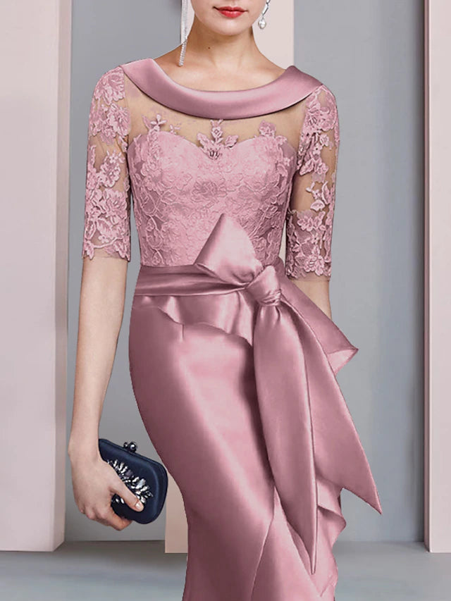 Back view of the formal high-low satin lace gown with a sweep train.