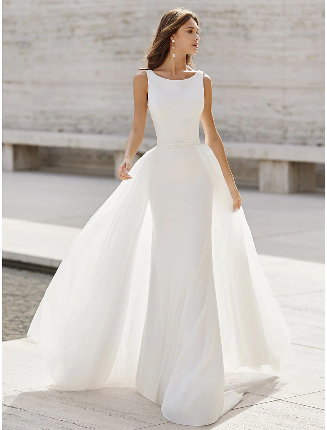 Elegant satin mermaid wedding dress with scoop neck and open back.