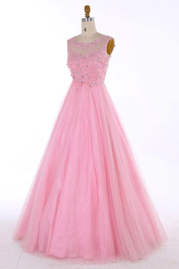 Close-up of the beaded appliques on the elegant scoop neck prom dress.