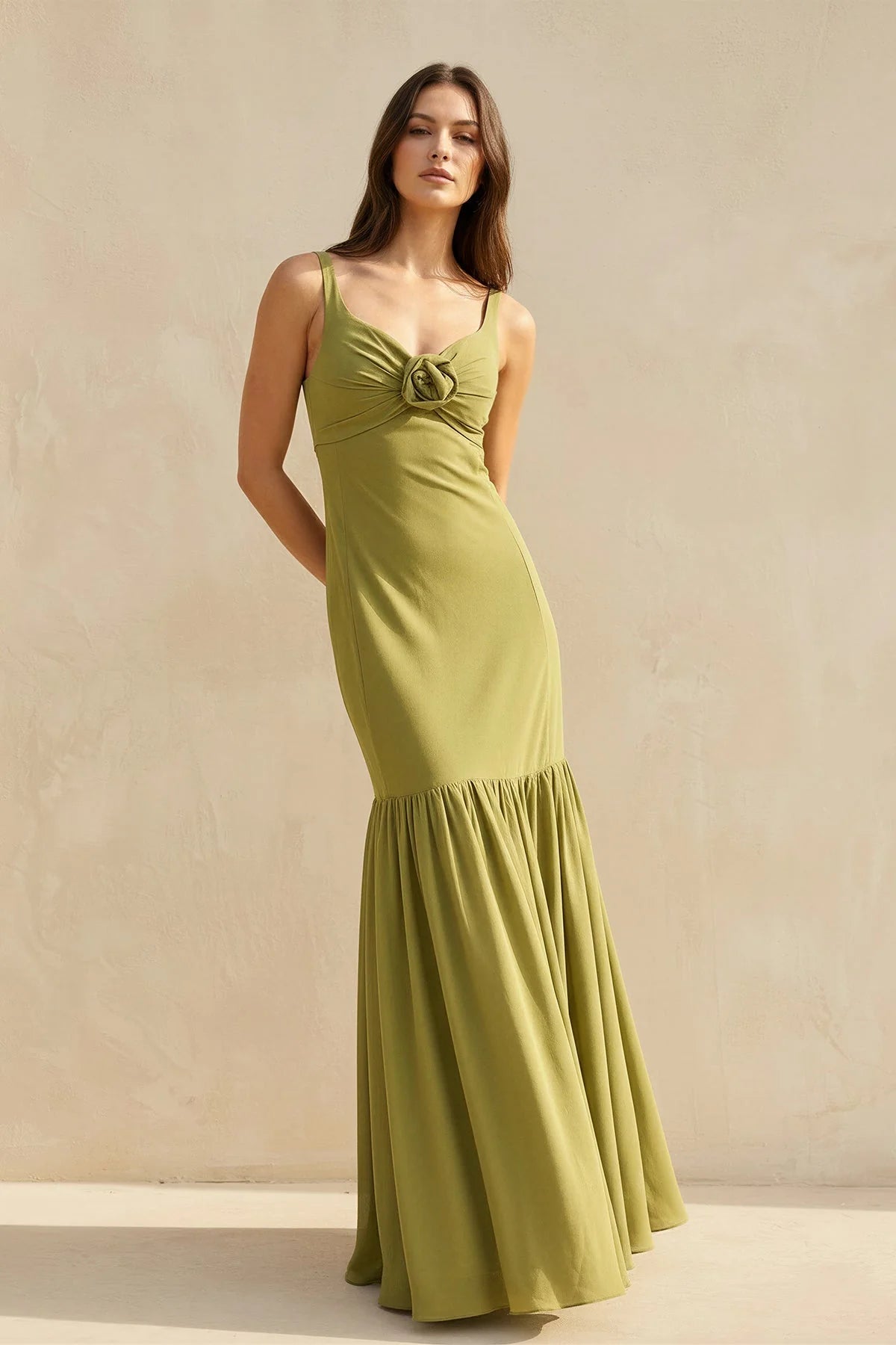 Mermaid gown with low scoop back and drop waist.