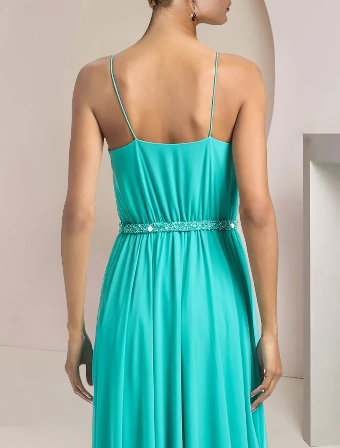 Full length view of the two-piece chiffon pantsuit, ideal for special events.
