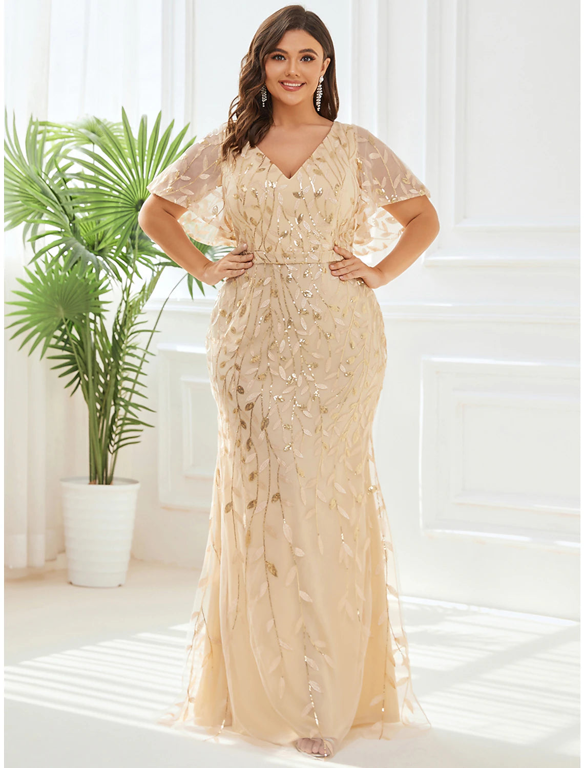 Woman posing gracefully in the elegant V-neck short sleeve formal dress.