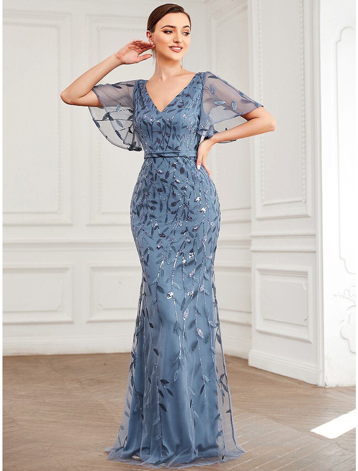 Side profile of the mermaid trumpet silhouette evening gown.