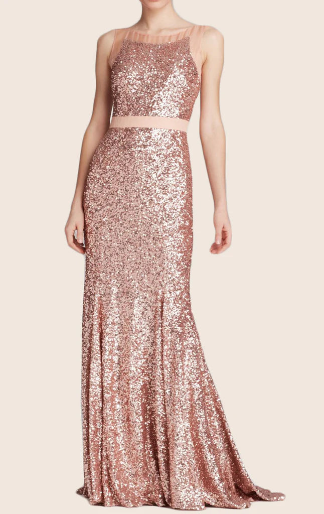 Model wearing an elegant sequin mermaid V-neck V-back maxi prom gown.