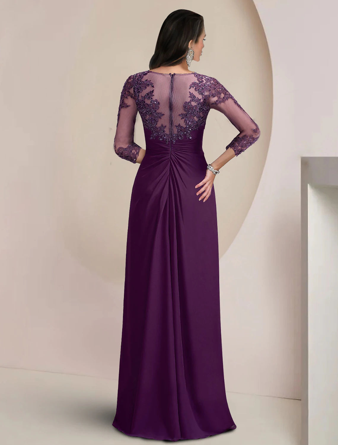 Side view of a floor-length sequin and lace Mother of the Bride dress.