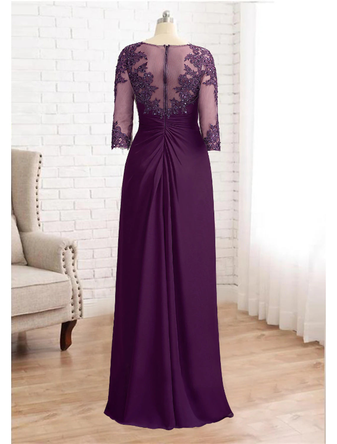 Full length view of the Mother of the Bride gown, showcasing its silhouette.