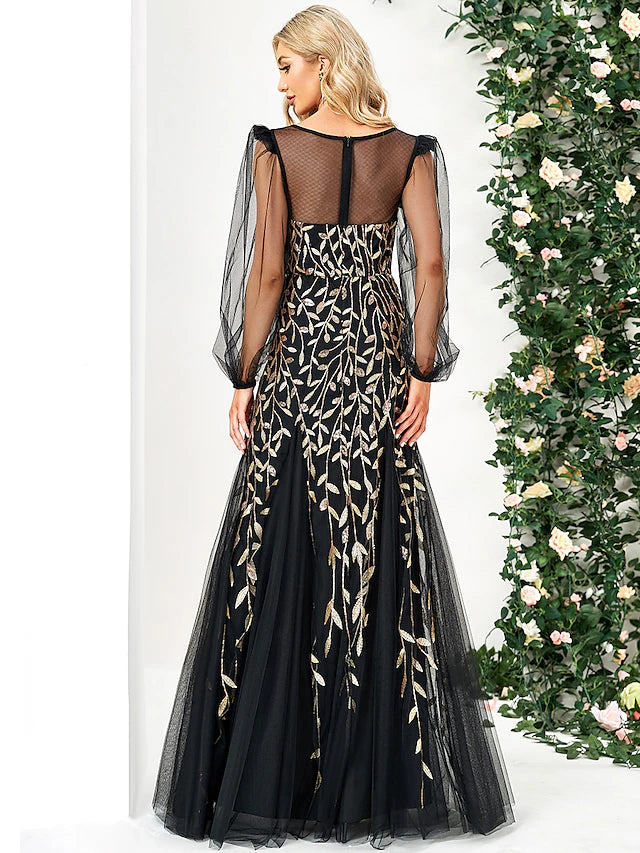 Side view of the mermaid trumpet evening gown with long sleeves.