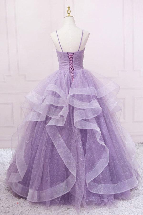 Back view of a sequin and tulle long formal dress.