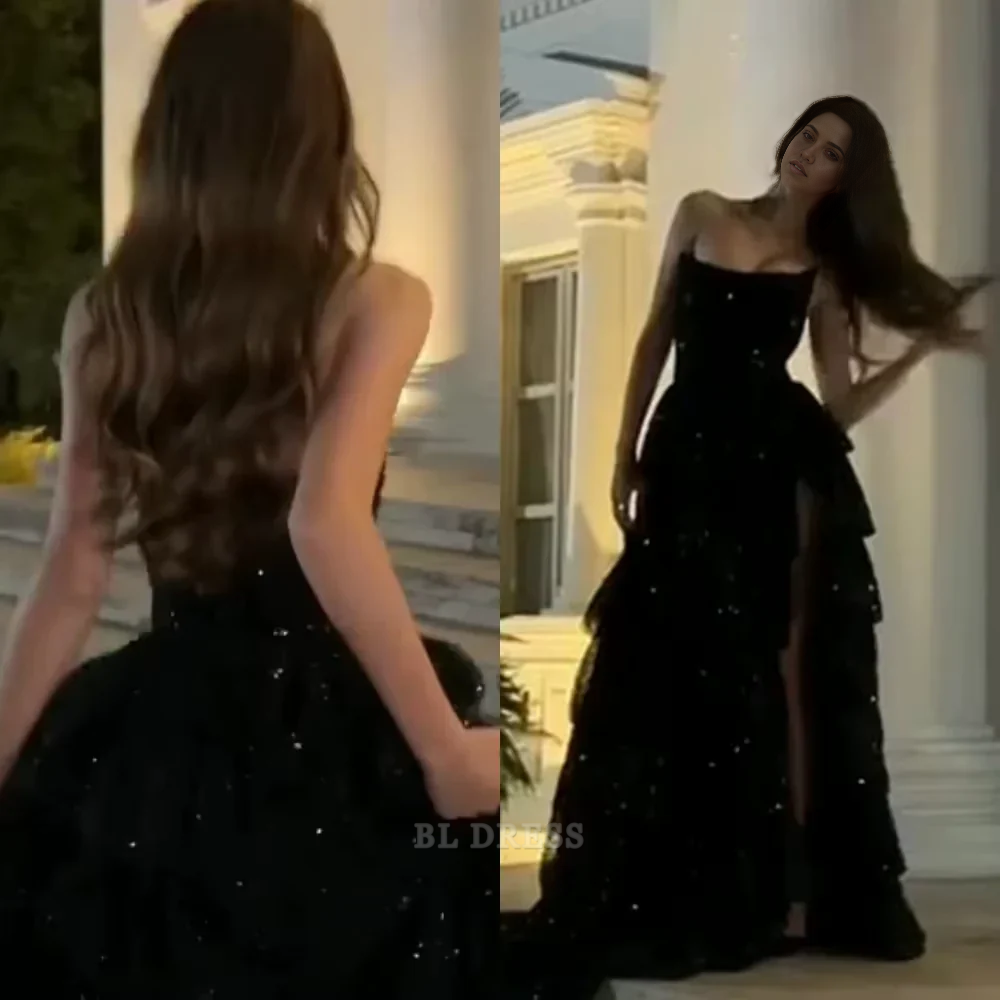 Back view of the elegant black sequined A-line formal dress.