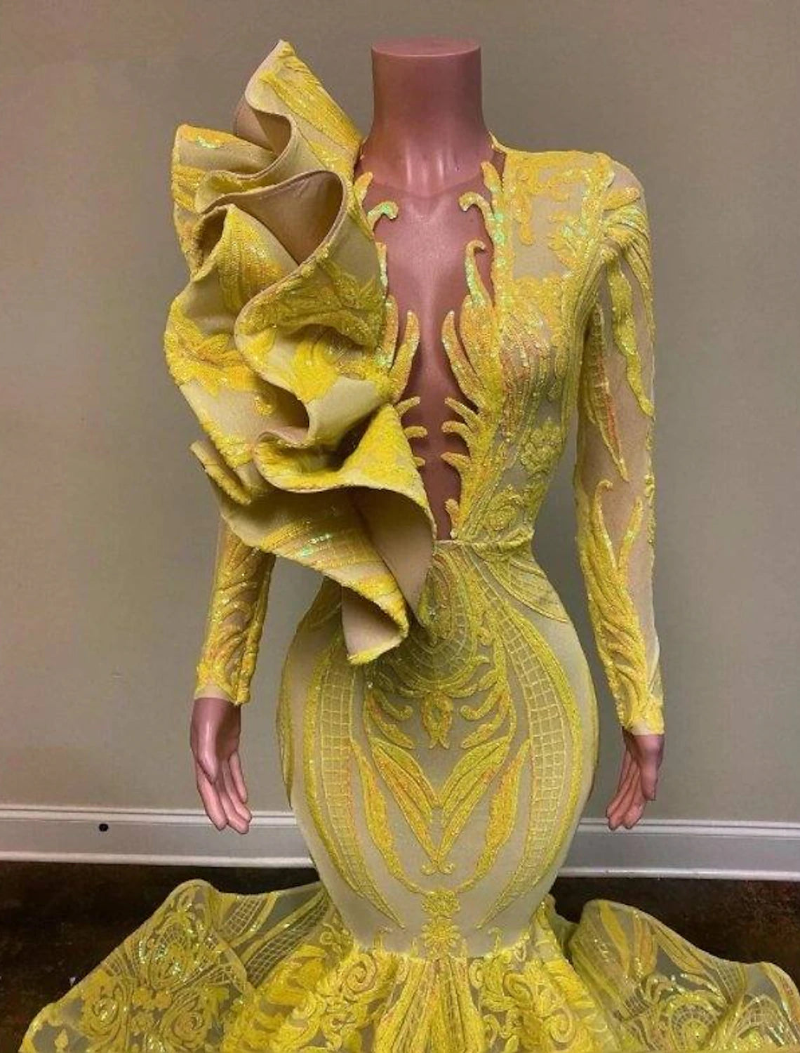 Back view of the sequined mermaid evening gown, showcasing the chapel train and elegant silhouette.