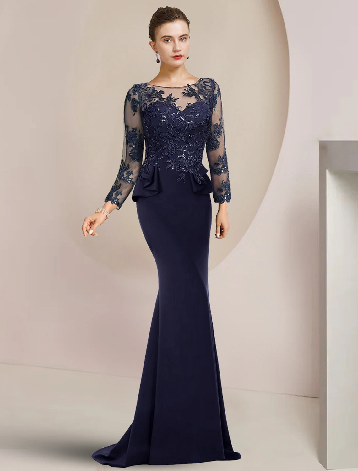 Elegant sequined mermaid mother of the bride dress with long sleeves and scoop neck.