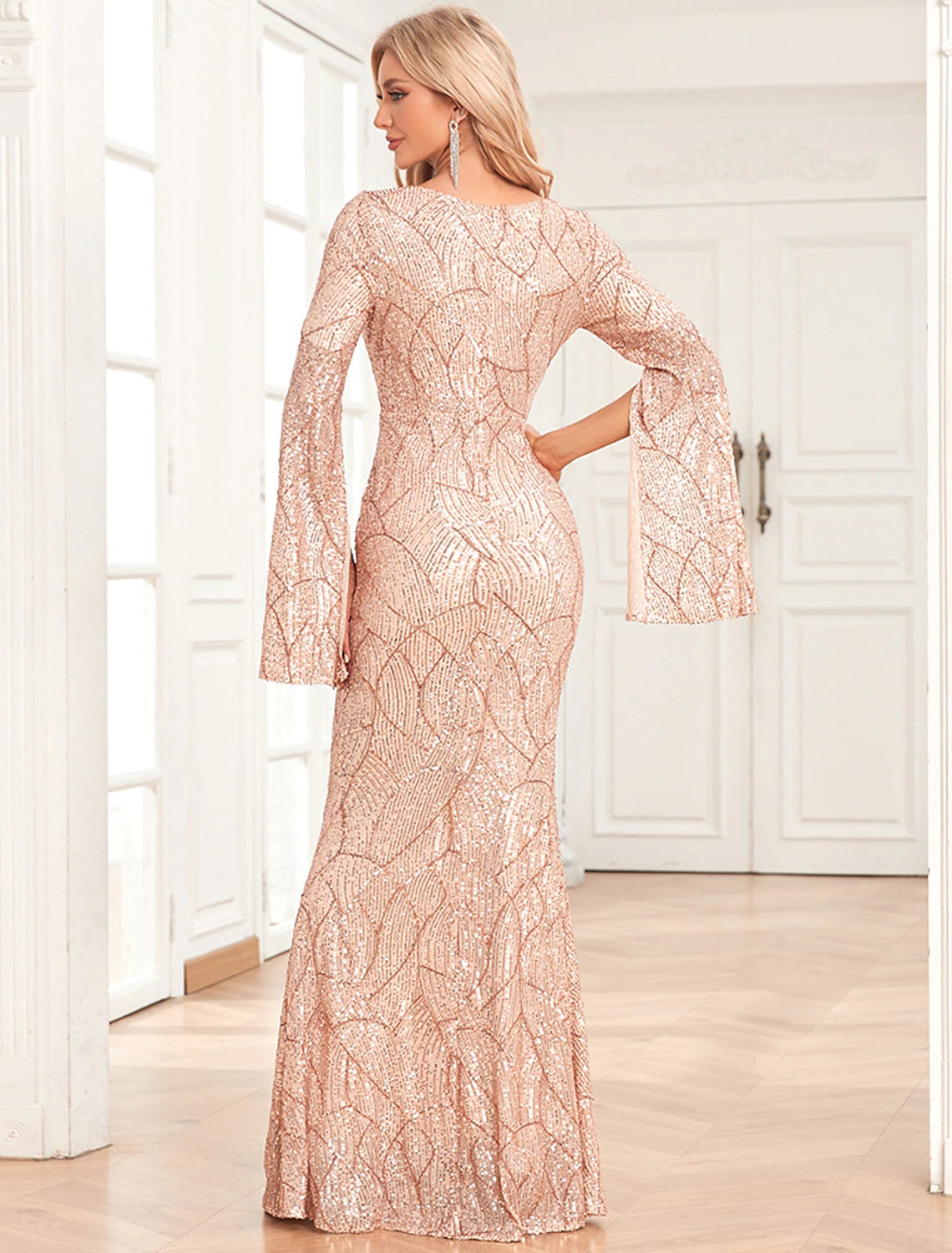 Full length view of the sequined mermaid trumpet gown, showcasing its floor-length design.