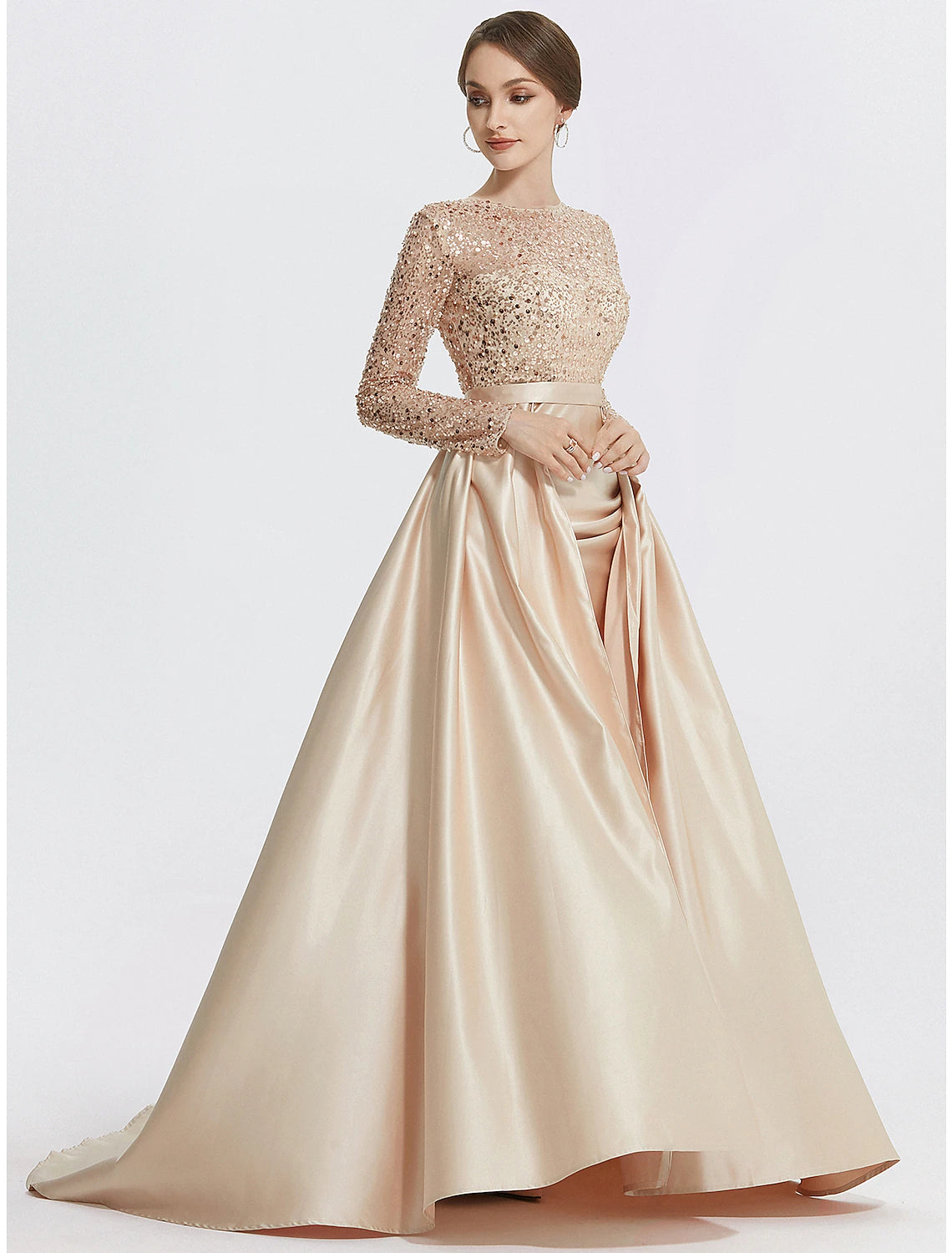 Full view of the mermaid trumpet gown, highlighting its flattering silhouette and shimmering fabric.