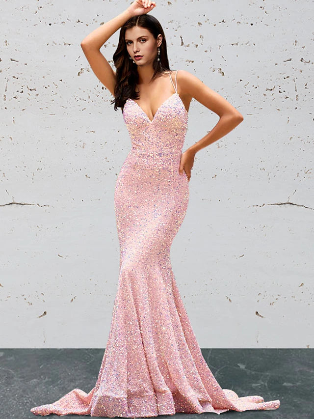 Elegant sequined mermaid trumpet prom dress with sweetheart neckline and open back.