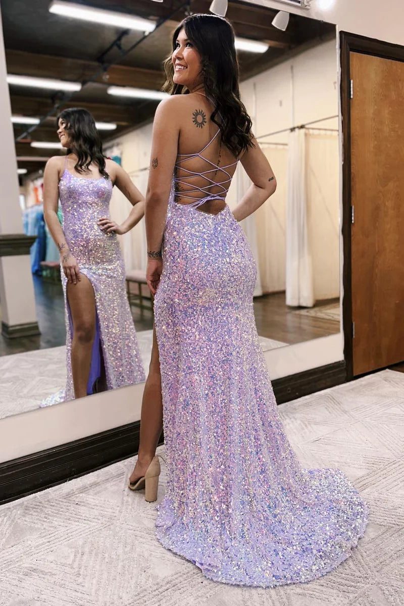Back view of a woman in a sequined floor-length formal gown.