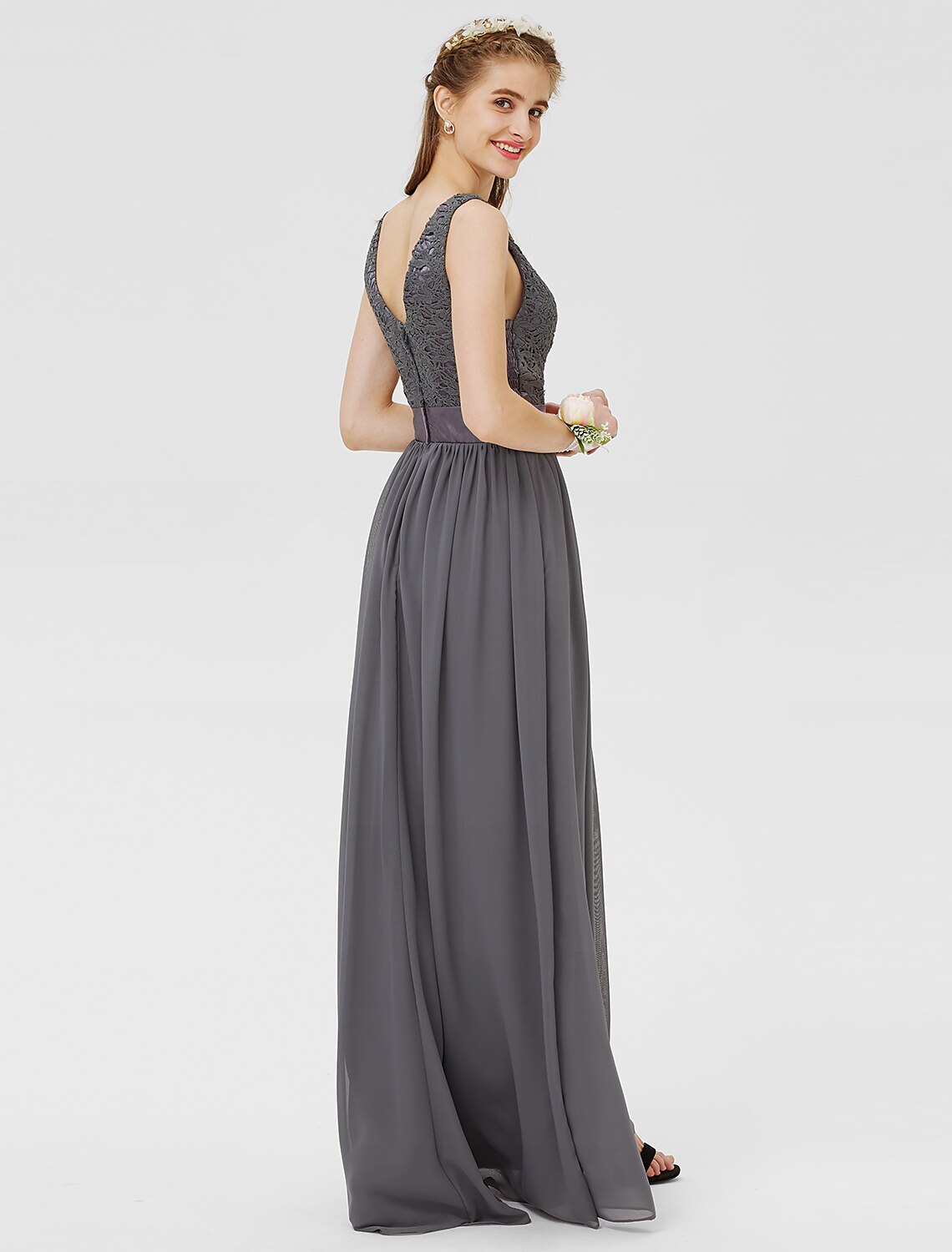 Back view of a floor-length chiffon bridesmaid dress.