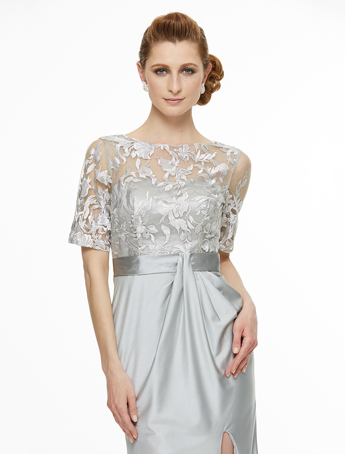 Full view of the woman posing in the bateau neck ankle-length dress.