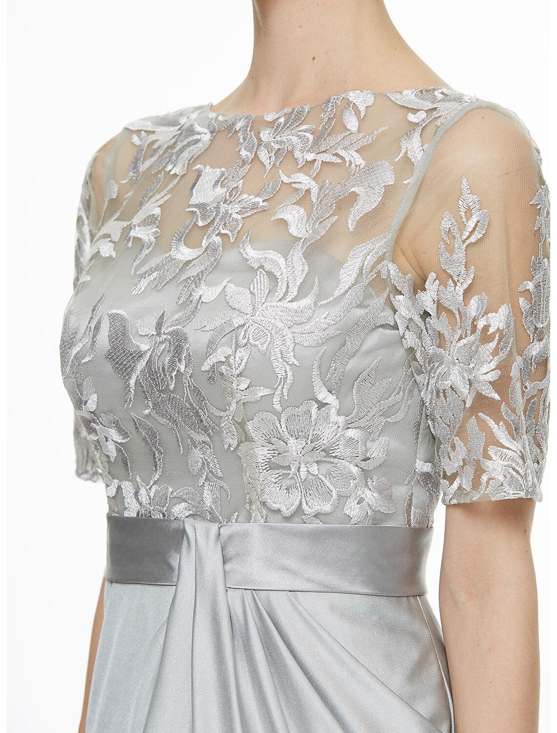 Rear view of the dress, emphasizing the column style and delicate fabric.