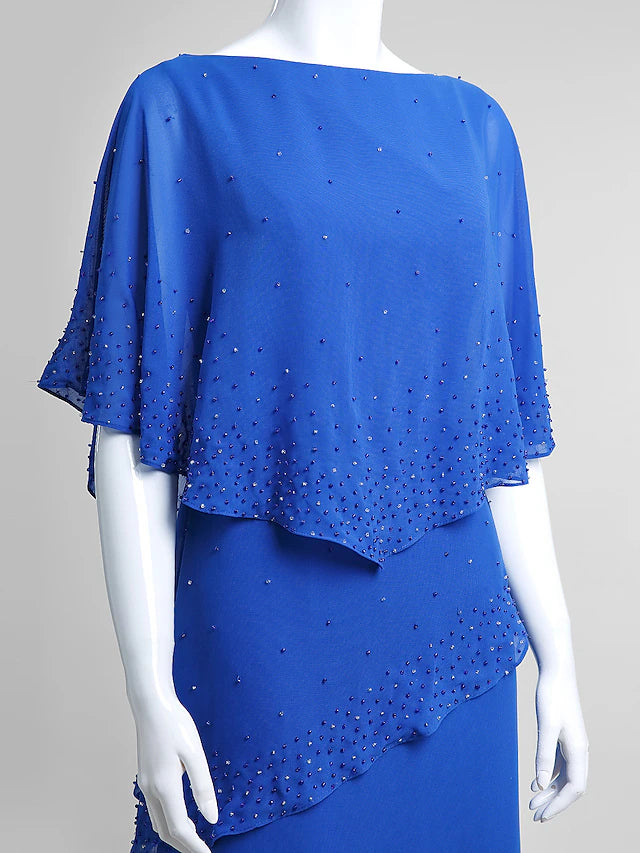 Close-up of delicate beading on the elegant dress neckline.