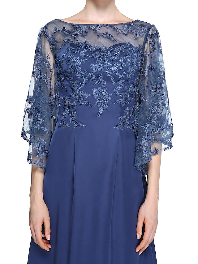 Close-up of the chiffon and lace fabric on the elegant ankle-length dress.